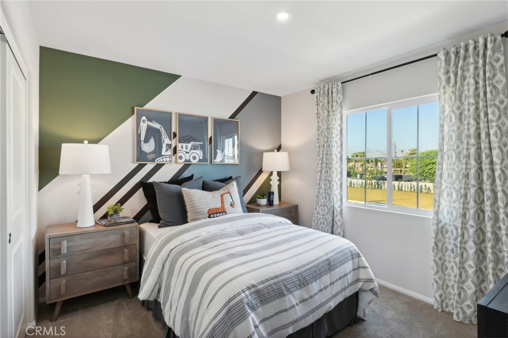49459 Meadowlark Place Indio, CA 92201 - Photo 32 of 33 a bedroom with bed and window