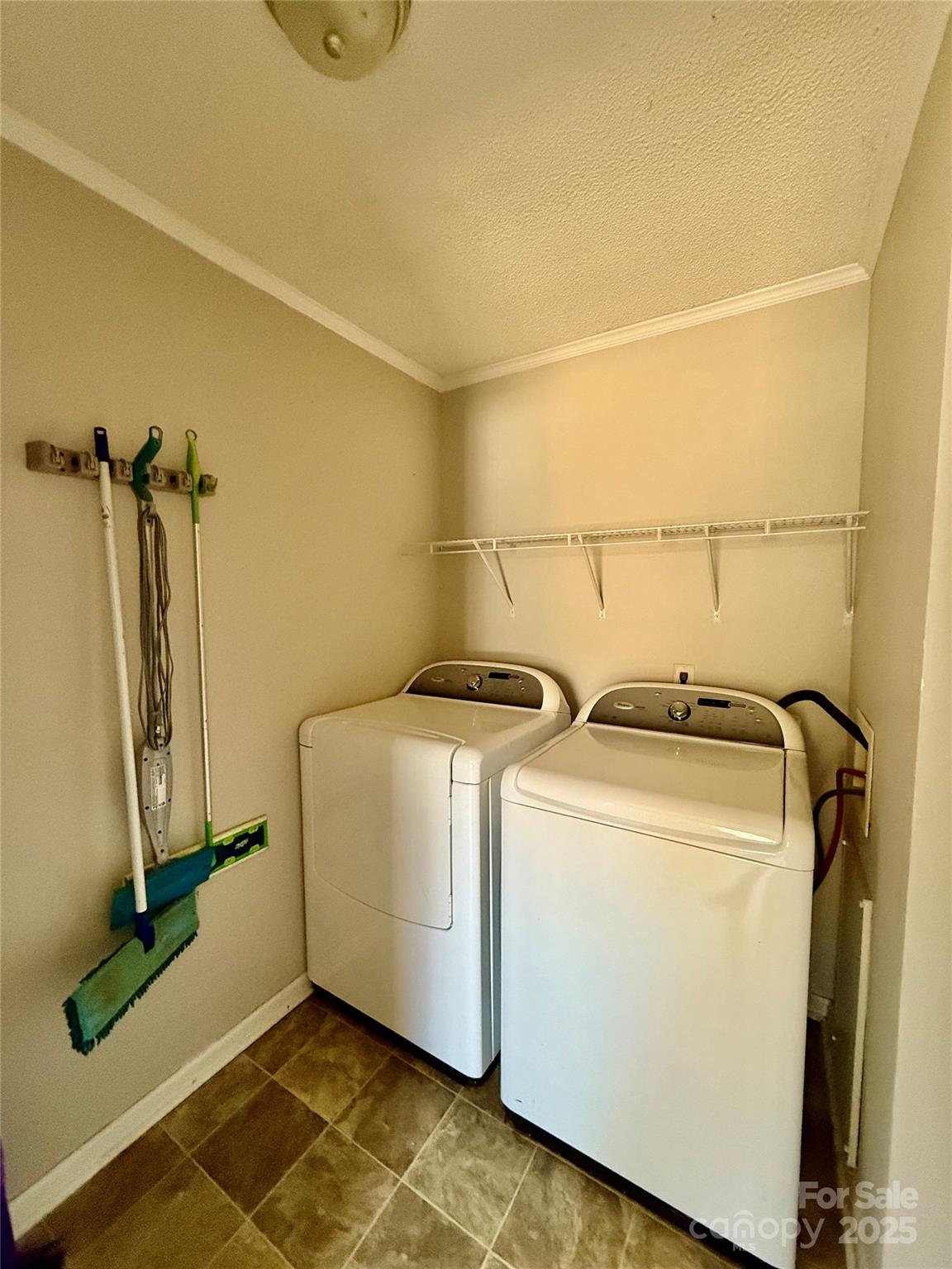 191 Ashford Drive Olin, NC 28660 - Photo 12 of 48 a utility room with dryer and washer