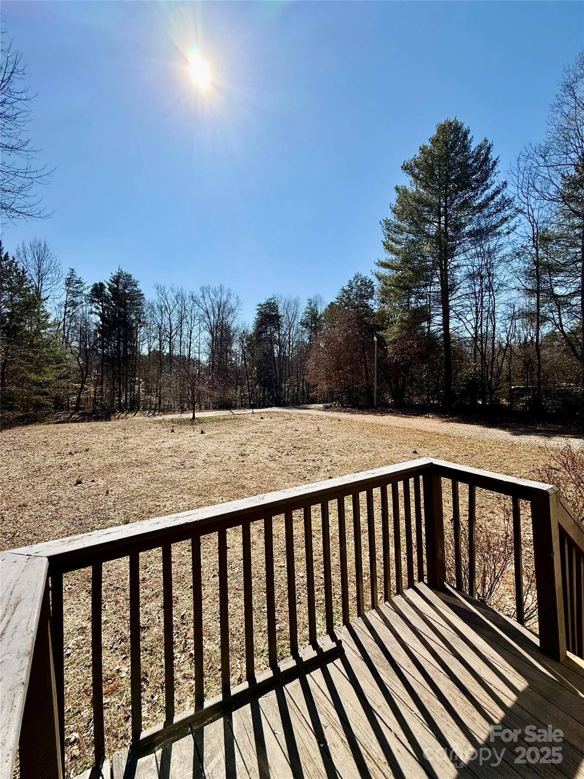 191 Ashford Drive Olin, NC 28660 - Photo 36 of 48 a view of balcony with wooden floor and outdoor space