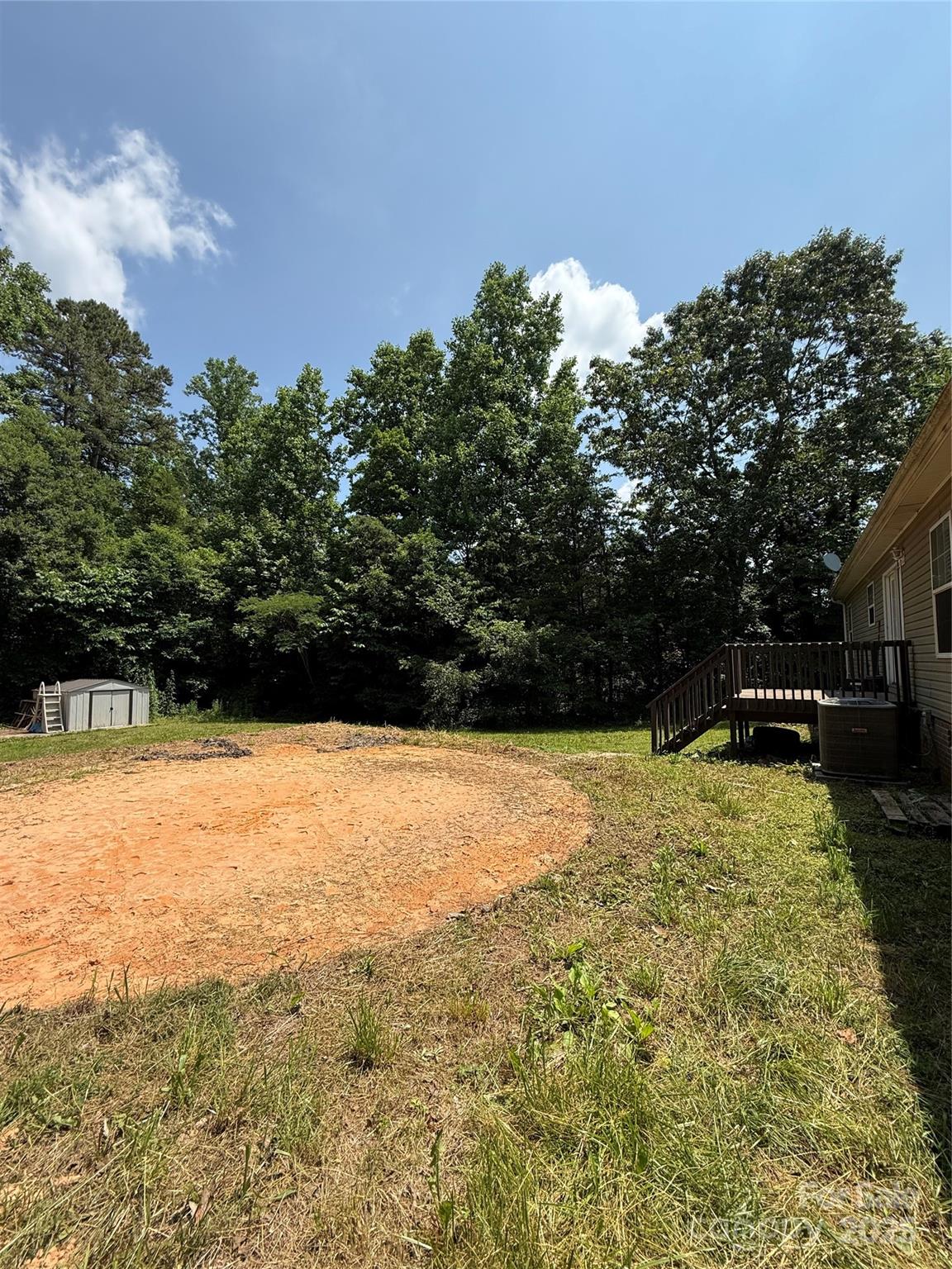 191 Ashford Drive Olin, NC 28660 - Photo 48 of 48 a view of an outdoor space and swimming pool
