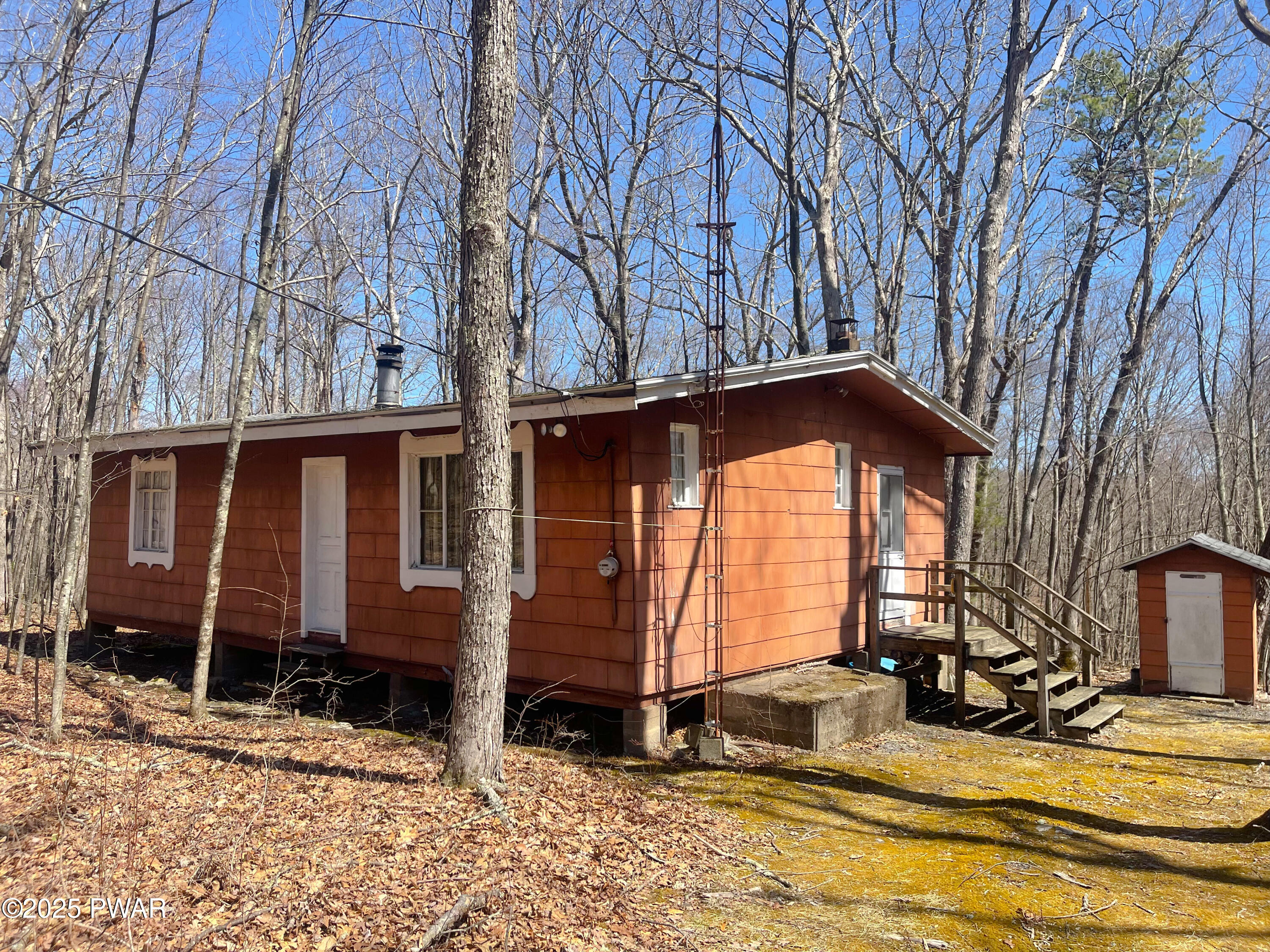 159 Five Mile Mdw Road, Unit 19C 957 Dingmans Ferry, PA 18328 - Photo 1 of 13 Front View of Cabin