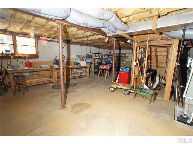 7309 Mevan Court Raleigh, NC 27613 - Photo 22 of 22 a view of a room with gym equipment