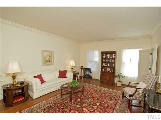 7309 Mevan Court Raleigh, NC 27613 - Photo 8 of 22 a living room with furniture and a window