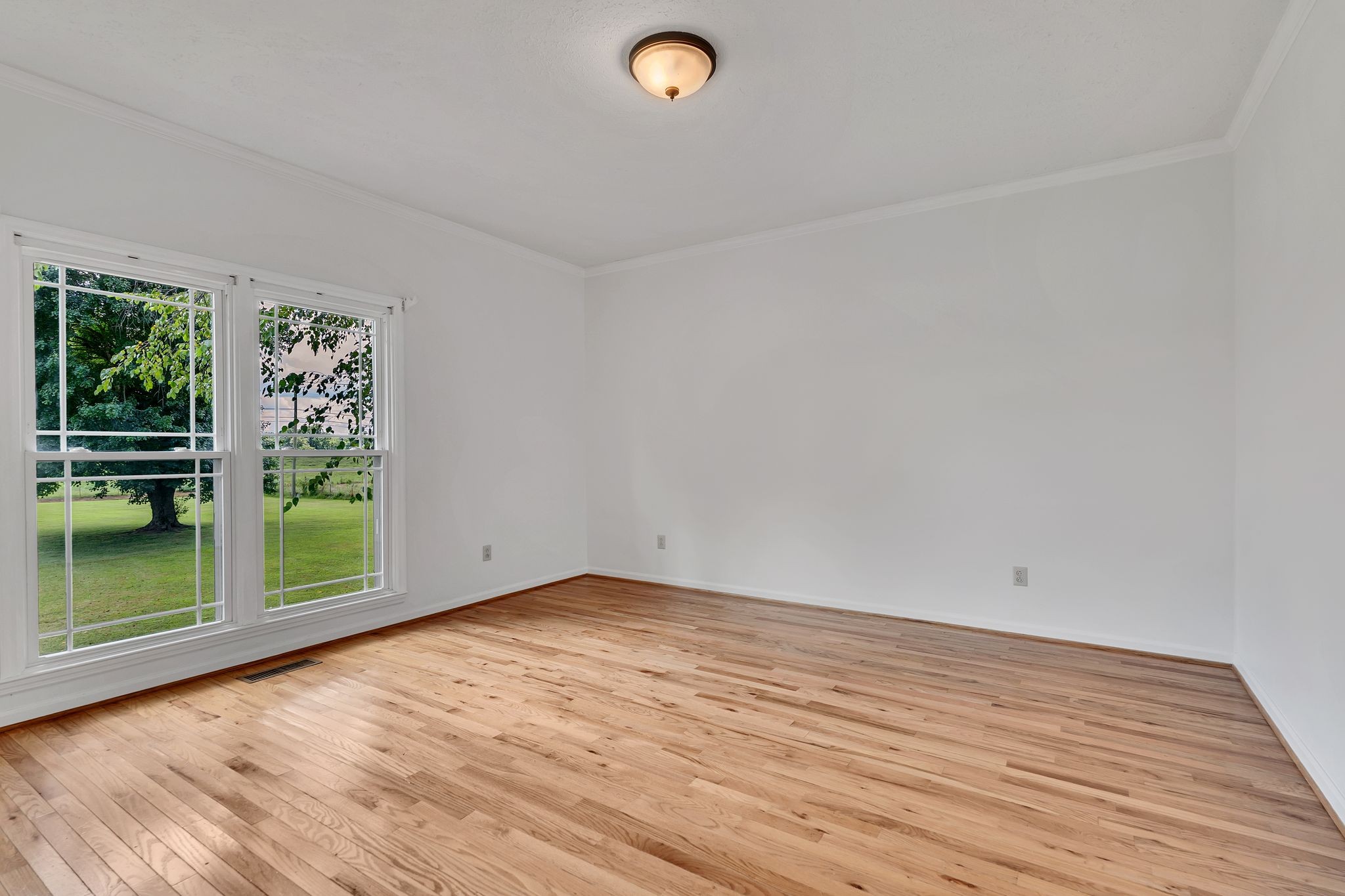 1395 Ragsdale Road Manchester, TN 37355 - Photo 29 of 52 a view of a room with wooden floor and window
