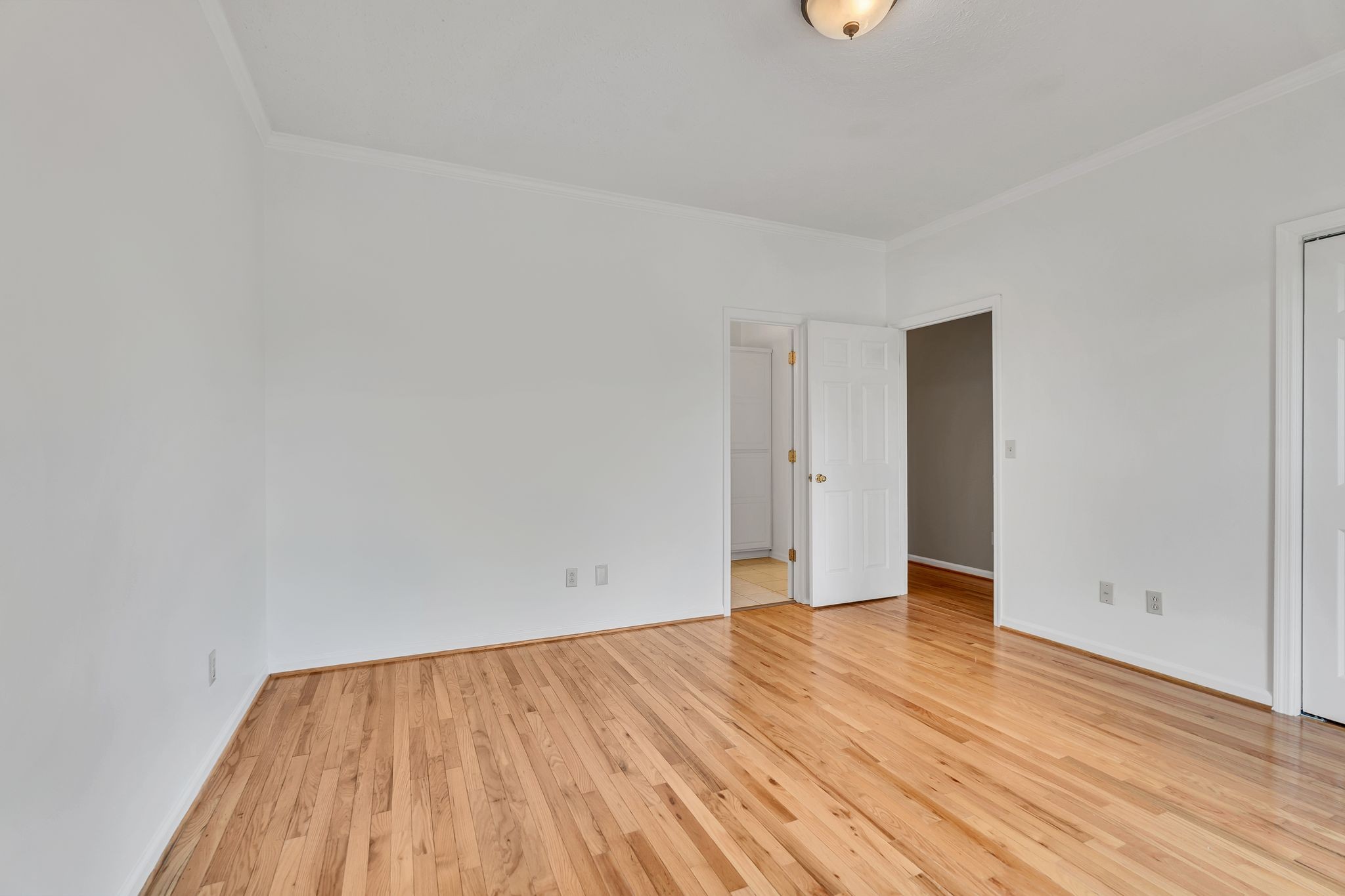 1395 Ragsdale Road Manchester, TN 37355 - Photo 31 of 52 a view of an empty room with wooden floor and a window