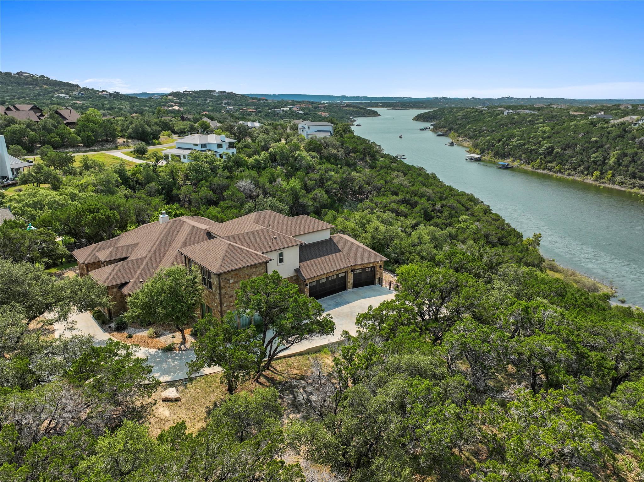 18817 Hidden Ridge Place Jonestown, TX 78645 - Photo 2 of 40 an aerial view of house with ocean view