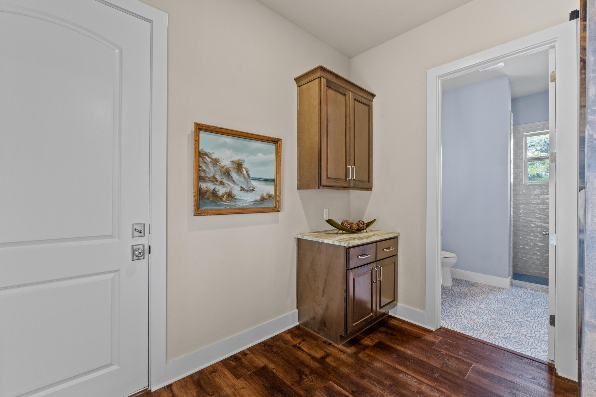 18817 Hidden Ridge Place Jonestown, TX 78645 - Photo 29 of 40 a view of a kitchen with wooden floor and electronic appliances