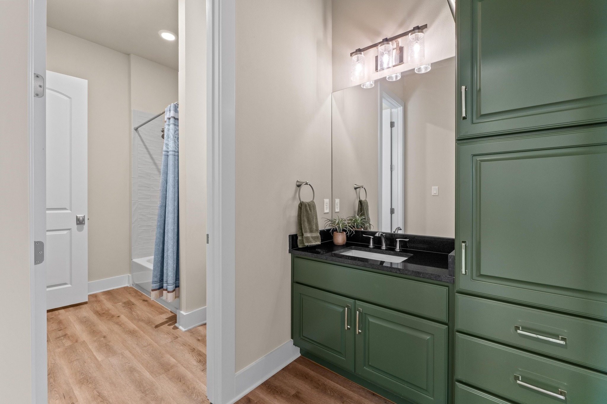18817 Hidden Ridge Place Jonestown, TX 78645 - Photo 32 of 40 a bathroom with a double vanity sink and mirror