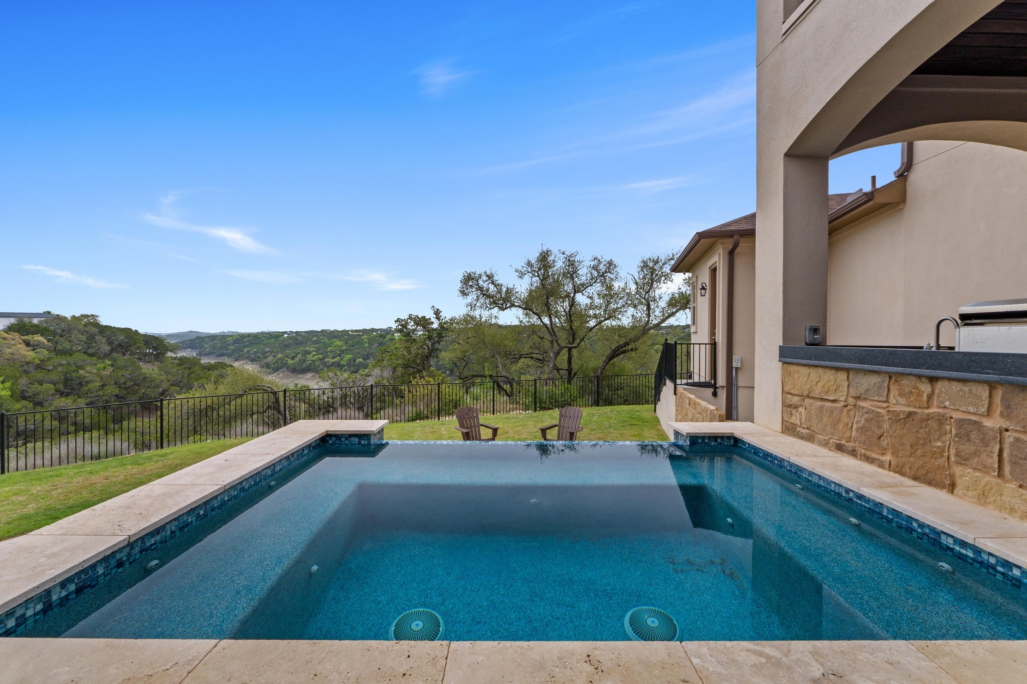 18817 Hidden Ridge Place Jonestown, TX 78645 - Photo 36 of 40 a view of an swimming pool with a yard