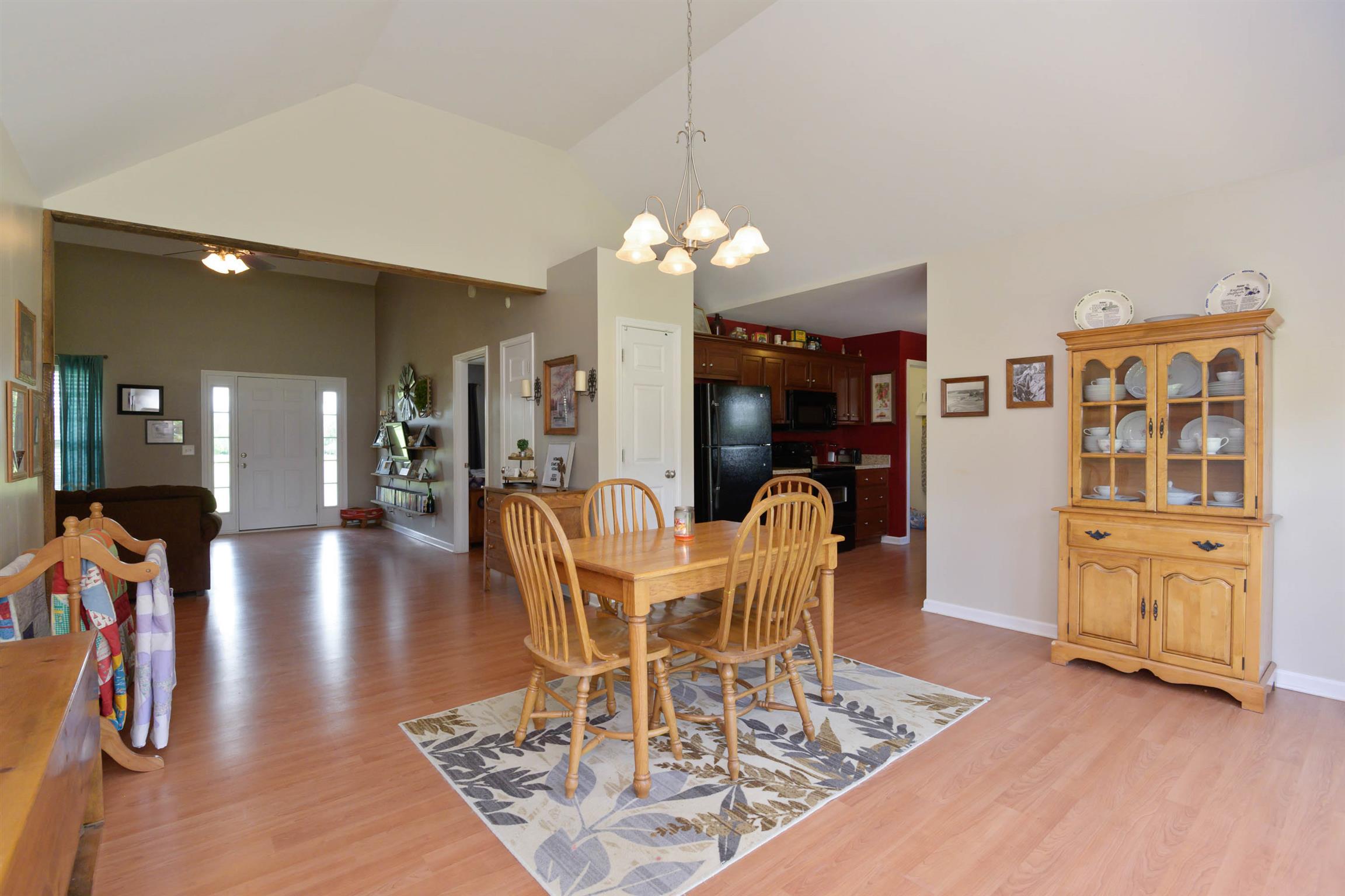 5184 Youngville Road Springfield, TN 37172 - Photo 13 of 29 a view of a dining room with furniture window and wooden floor