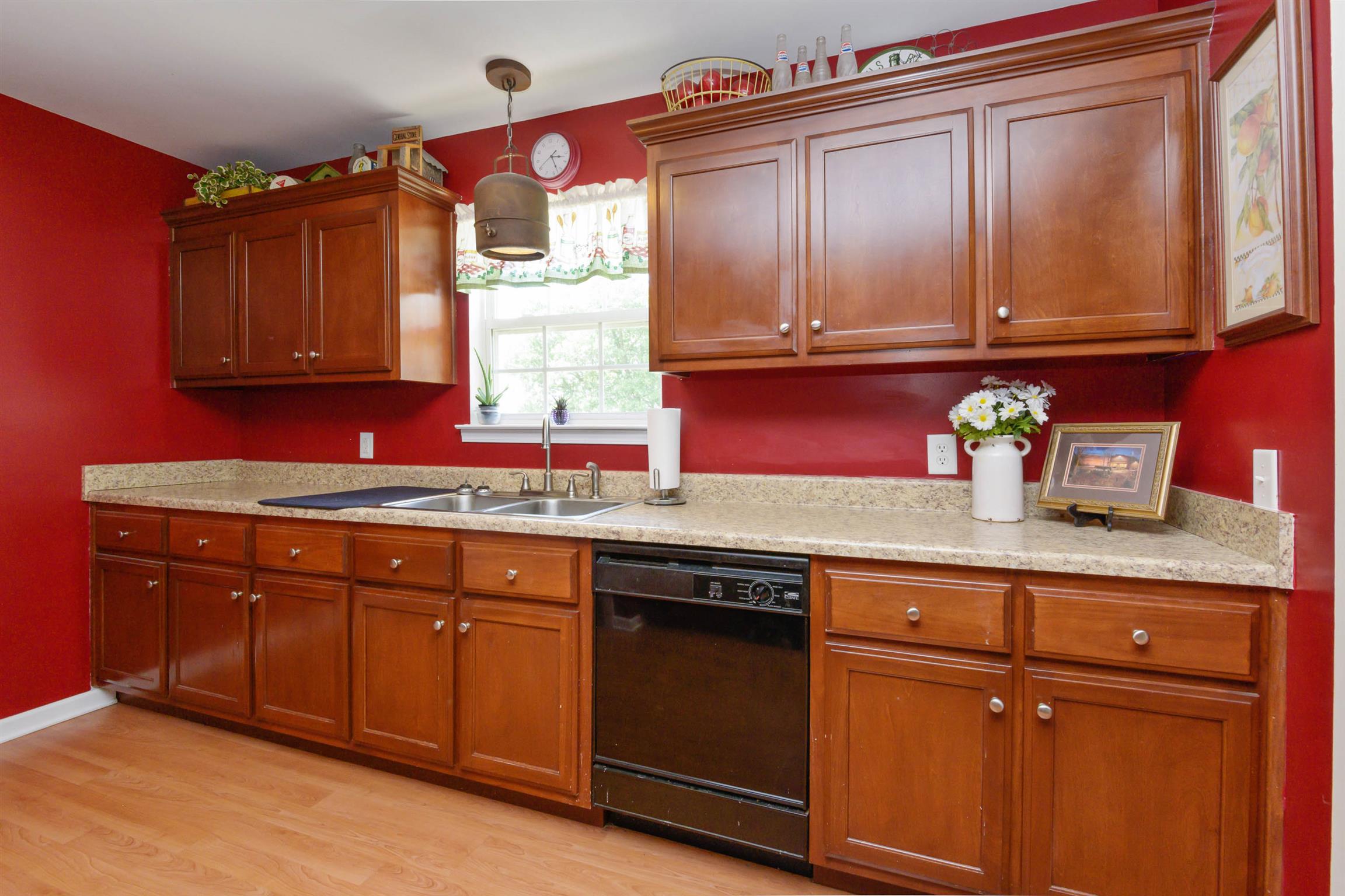 5184 Youngville Road Springfield, TN 37172 - Photo 9 of 29 a kitchen with granite countertop cabinets stainless steel appliances and a sink