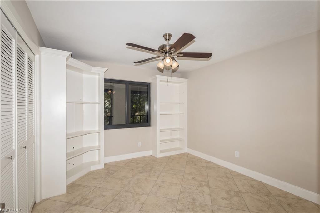 4963 Pepper Circle, Unit D202 Naples, FL 34113 - Photo 12 of 17 a view of an empty room