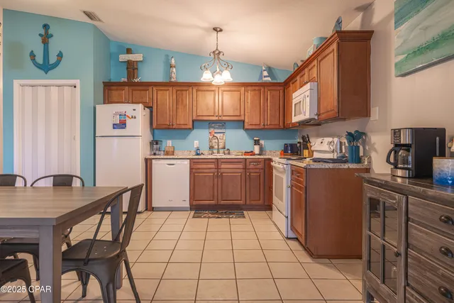 $294,900 | 5504 Hilltop Avenue, Unit E, Panama City Beach, FL 32408