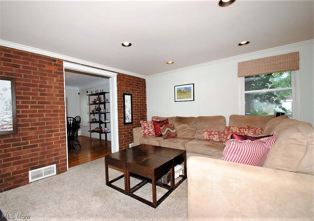2555 Milton Road Cleveland, OH 44118 - Photo 5 of 14 Another view of Family Room with Brick Feature Wall.