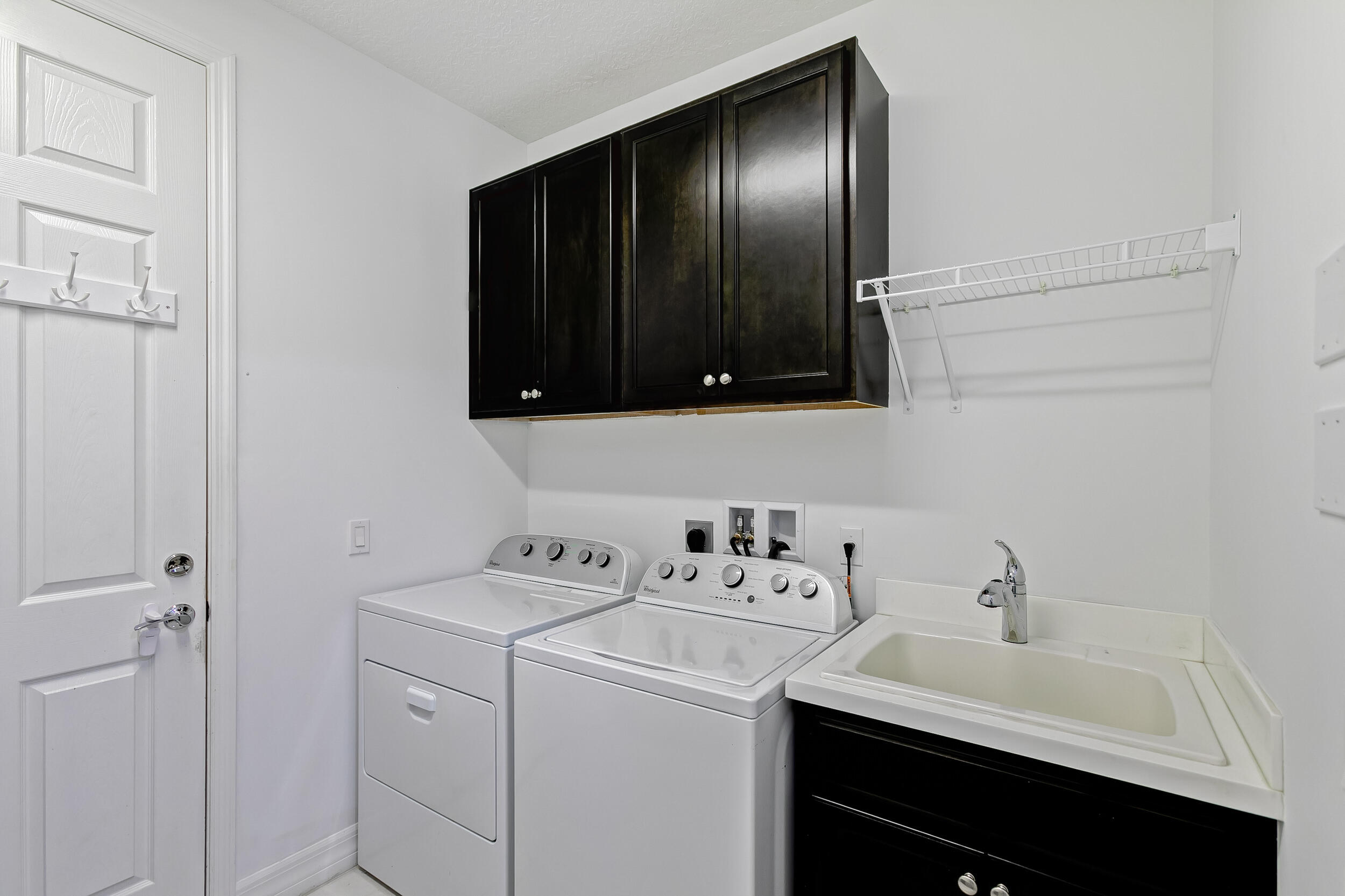1139 Turnbridge Drive Jupiter, FL 33458 - Photo 28 of 60 1st floor Laundry