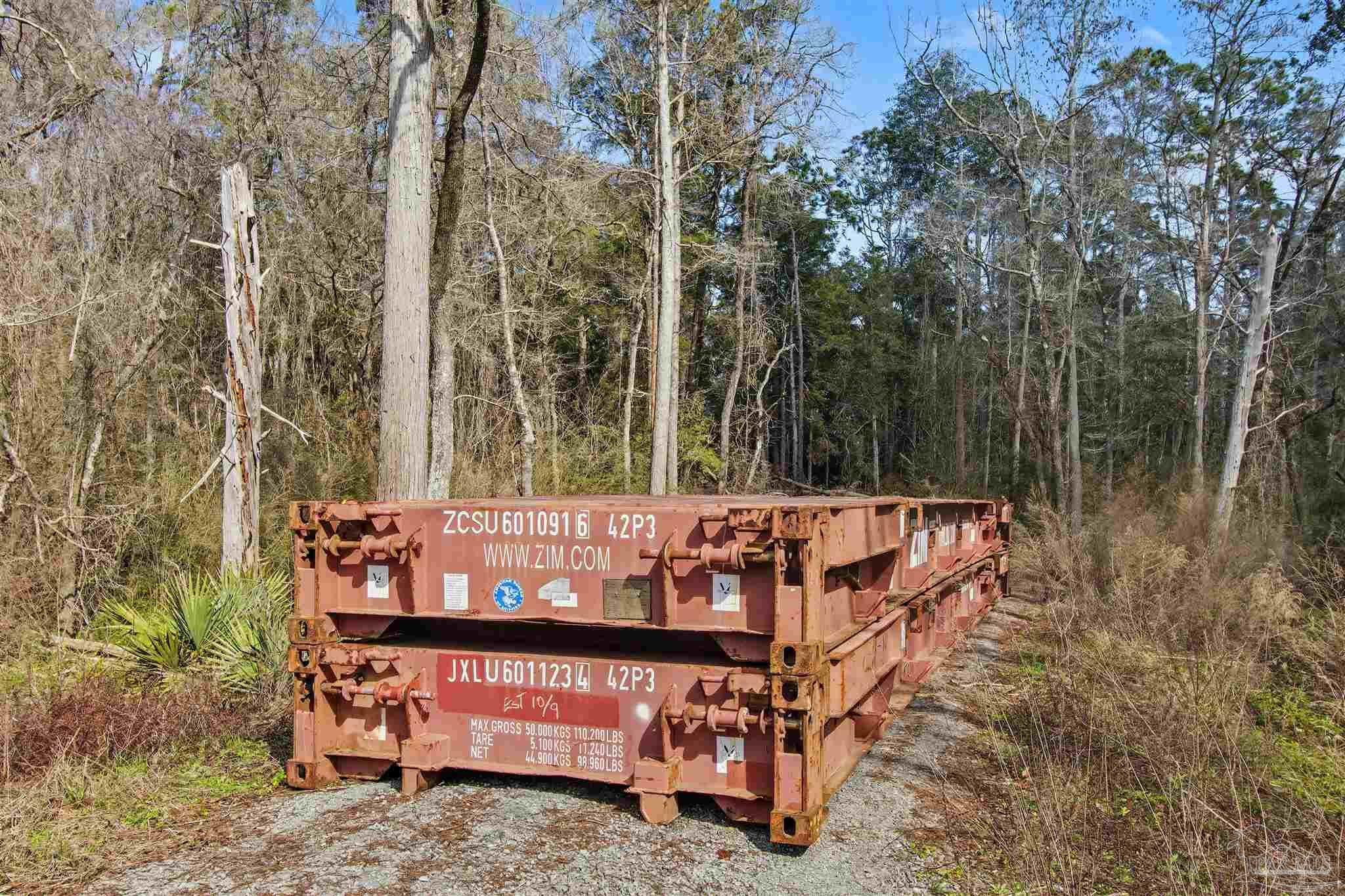 10736 County Road 83 Elberta, AL 36530 - Photo 14 of 15 a view of bench with trees in the background