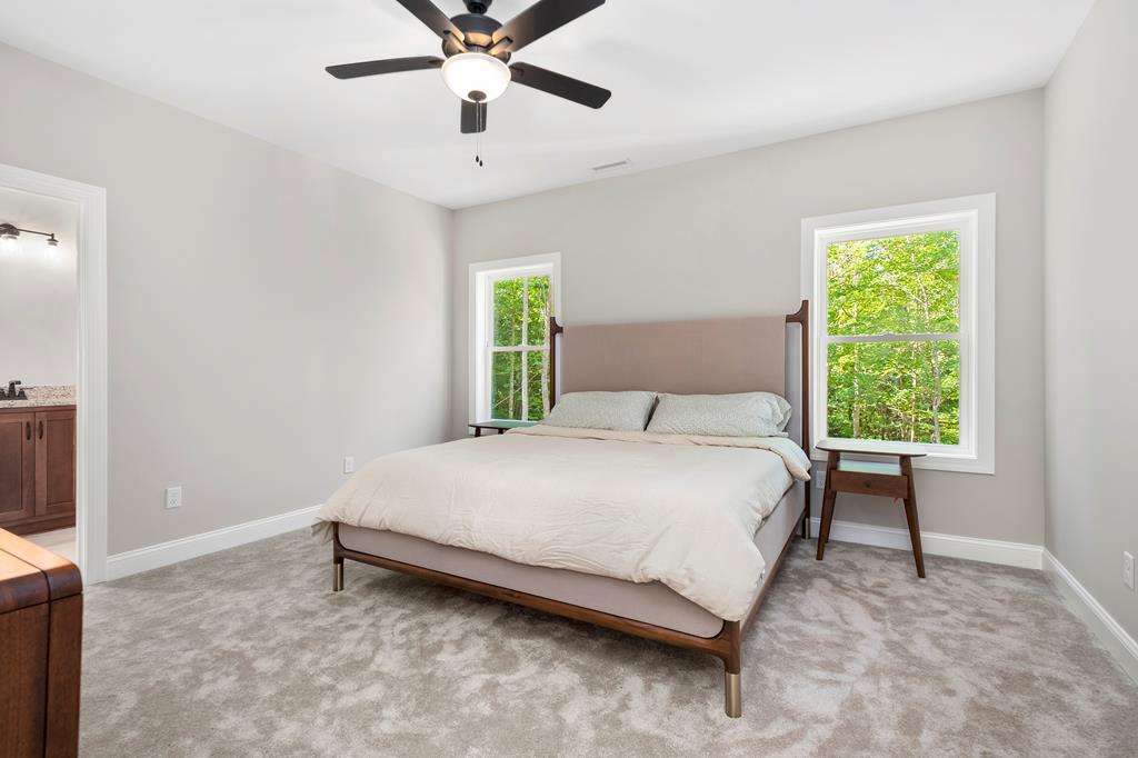 8 Hawks Nest Road Blairsville, GA 30512 - Photo 13 of 30 a bedroom with a bed and a window