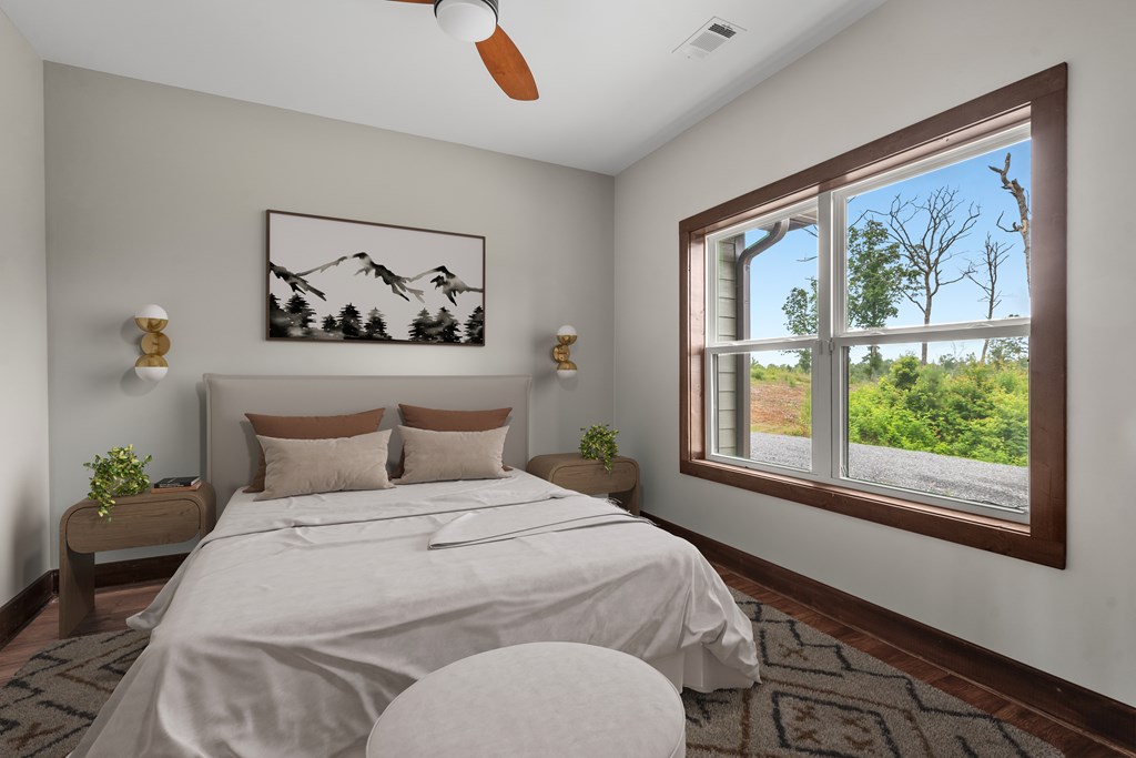 8 Hawks Nest Road Blairsville, GA 30512 - Photo 21 of 30 a bedroom with a large bed and a window