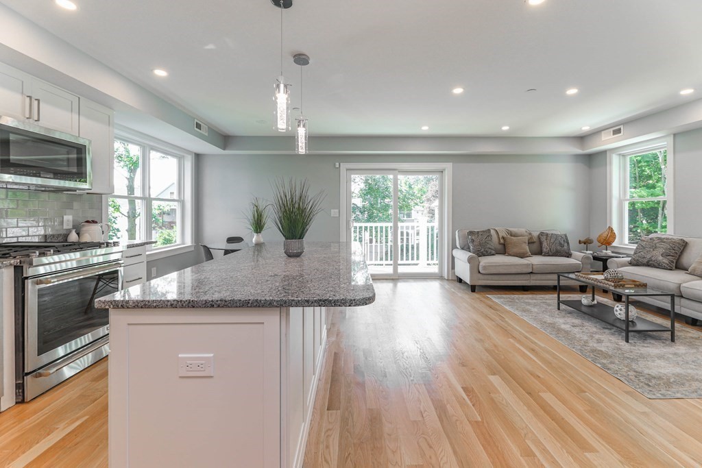 34 Colgate Road, Unit 2 Boston, MA 02131 - Photo 11 of 19 a kitchen with counter top space a sink appliances and cabinets