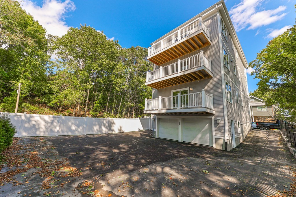 34 Colgate Road, Unit 2 Boston, MA 02131 - Photo 17 of 19 a view of a house with a yard