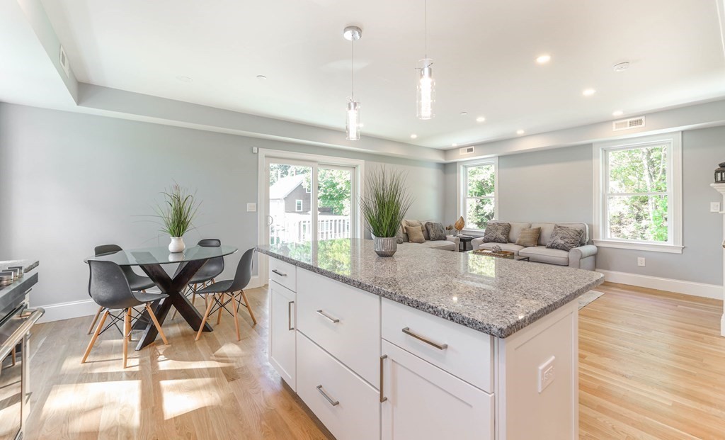 34 Colgate Road, Unit 2 Boston, MA 02131 - Photo 8 of 19 a view of dining table chairs and entryway