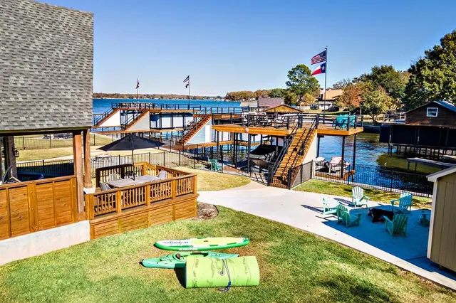 swimming pool view with a seating space