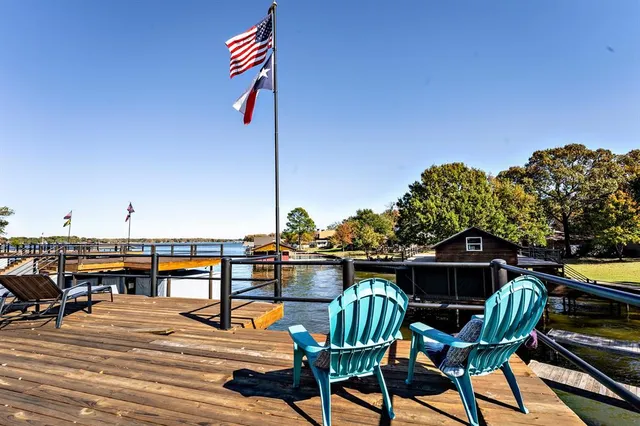 a terrace with outdoor seating and city view