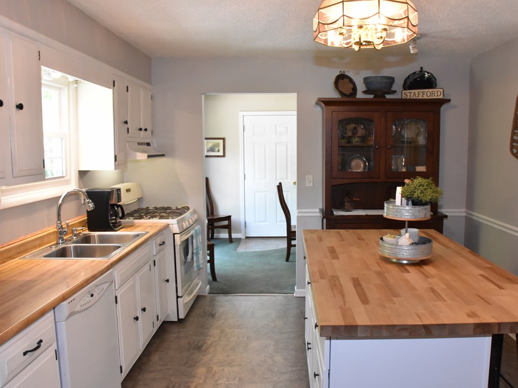 10681 Cutter Road Meadville, PA 16335 - Photo 13 of 29 a kitchen with sink refrigerator and window