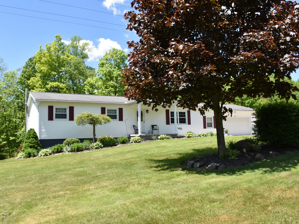 10681 Cutter Road Meadville, PA 16335 - Photo 2 of 29 a front view of a house with a yard
