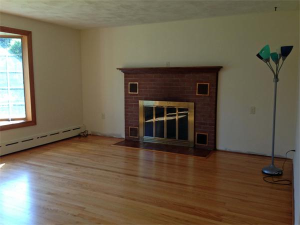 334 Spring Street Northampton, MA 01062 - Photo 5 of 6 a view of an empty room with wooden floor and a window