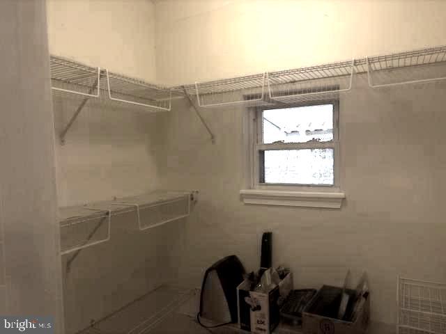 331 Rossiter Avenue Baltimore, MD 21212 - Photo 7 of 28 a bathroom with a window and a shower