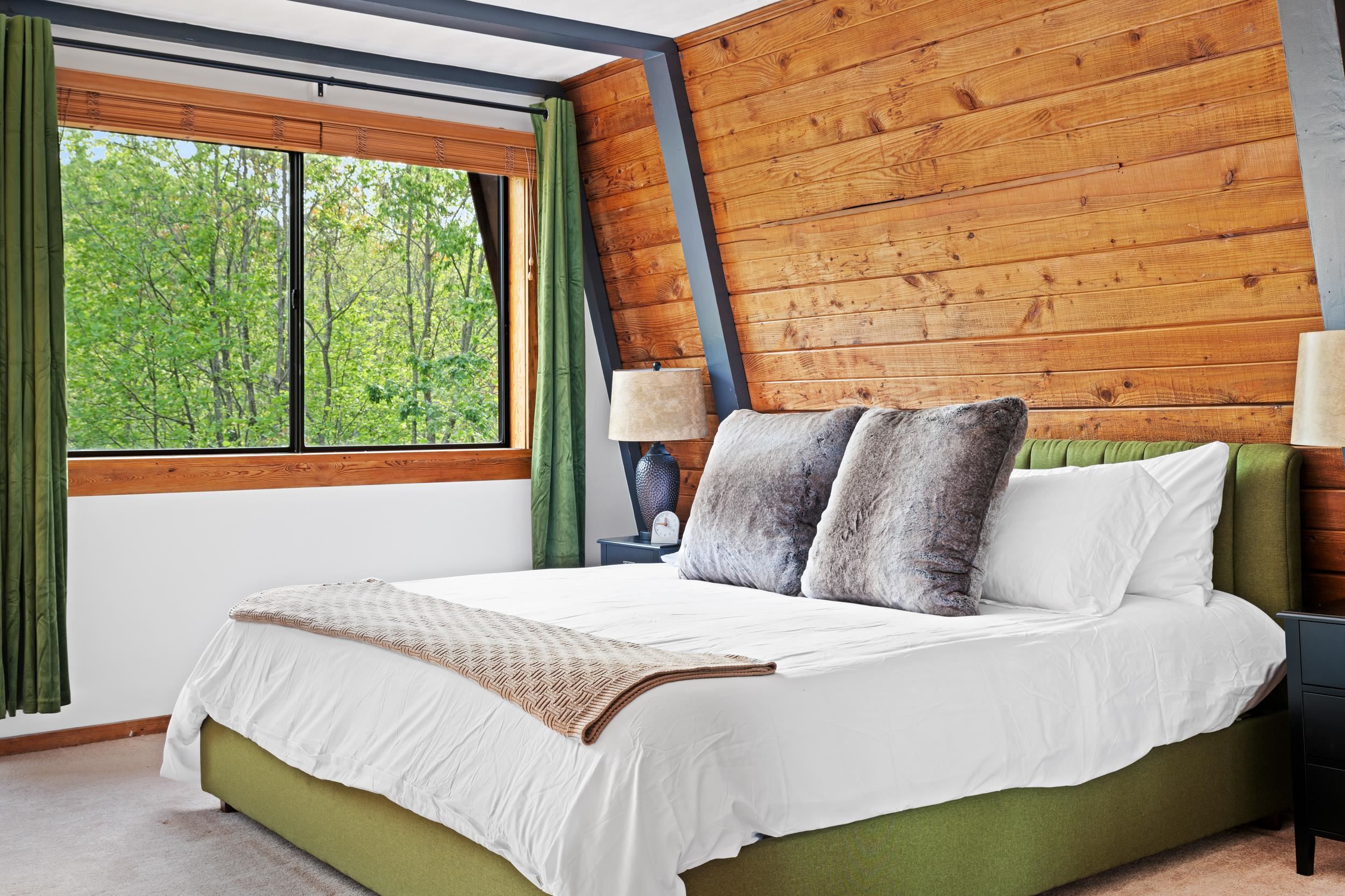 307 CC Road Madison, VA 22727 - Photo 20 of 26 a bed sitting in a bedroom next to a window