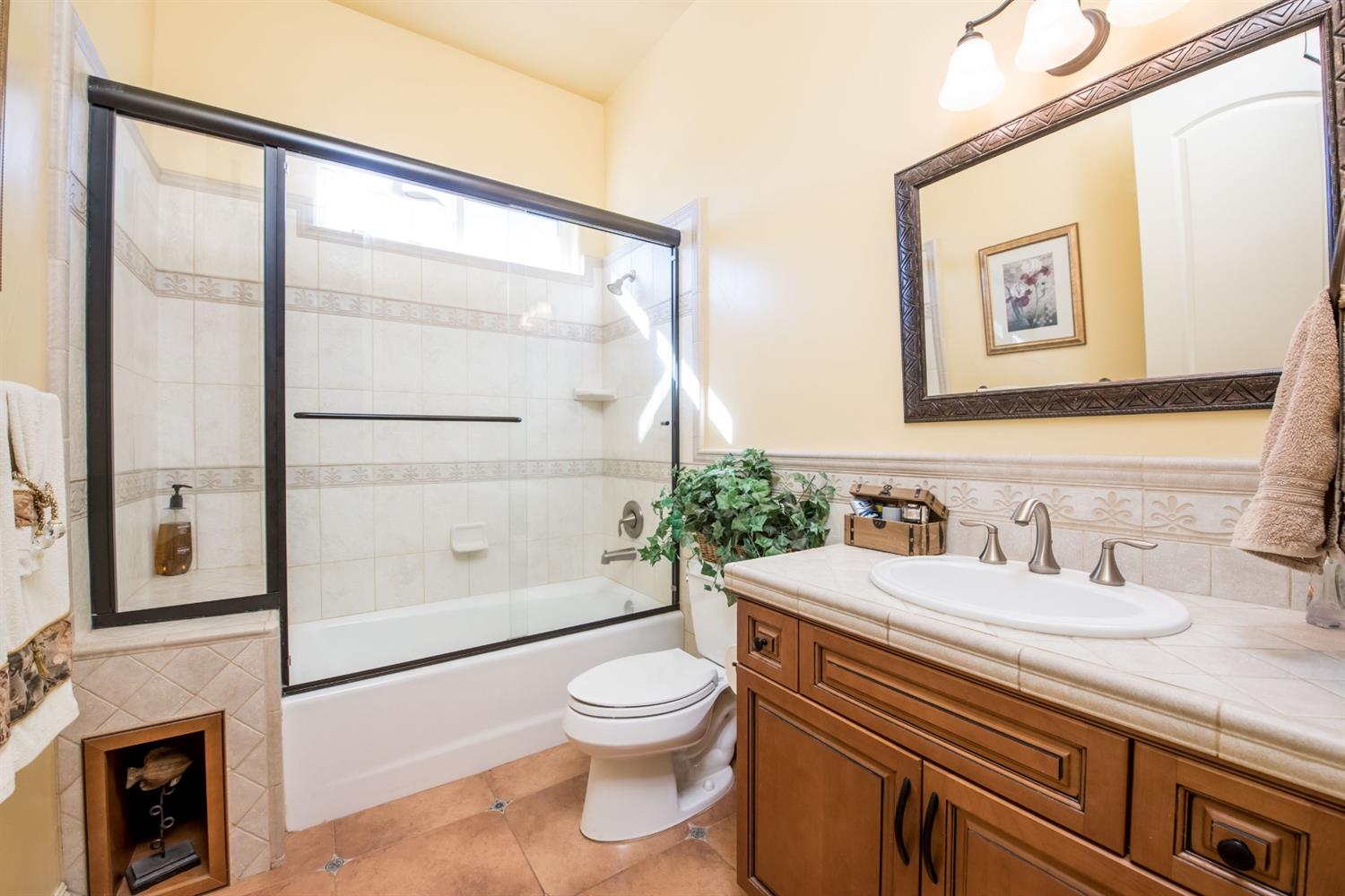 50070 Butterfield Stage Road O'Neals, CA 93645 - Photo 22 of 55 Lovely hall bath conveniently located next to both bedrooms on the west end of the home....