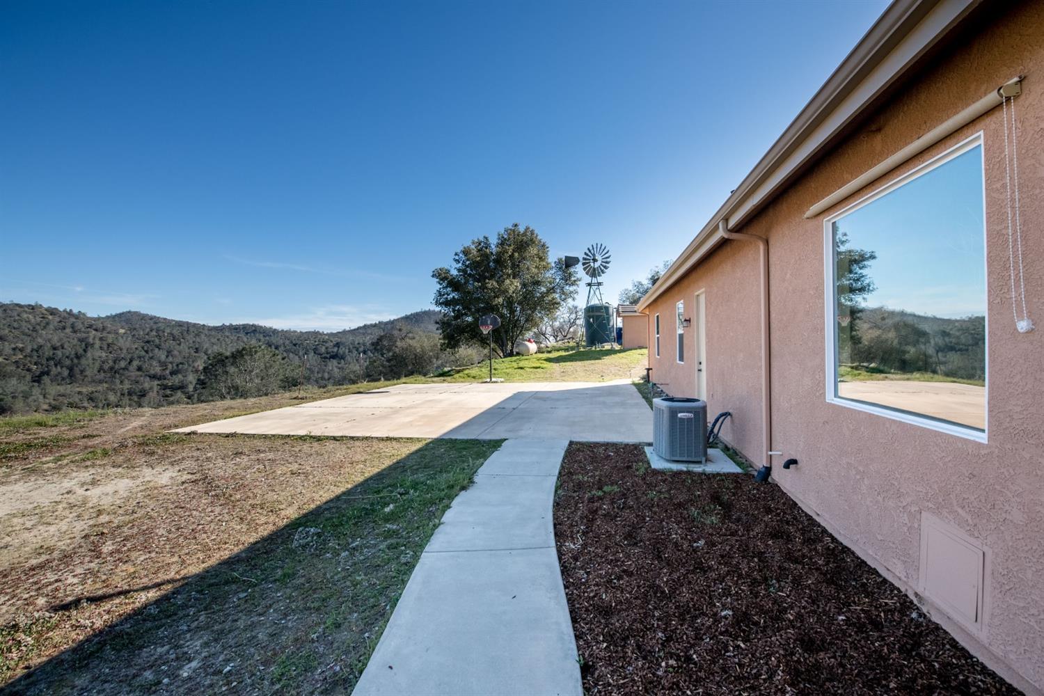 50070 Butterfield Stage Road O'Neals, CA 93645 - Photo 40 of 55 Your very own decorative windmill and basketball court or extra parking.....