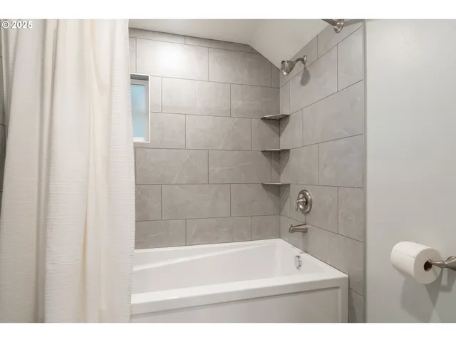 a bathroom with a bathtub