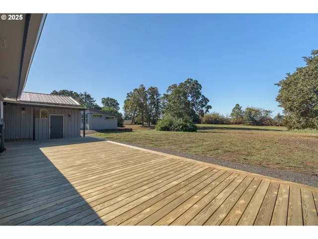 a view of outdoor space with wooden deck