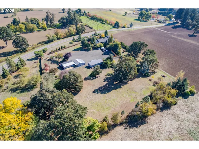 a view of a lake with beach and outdoor space