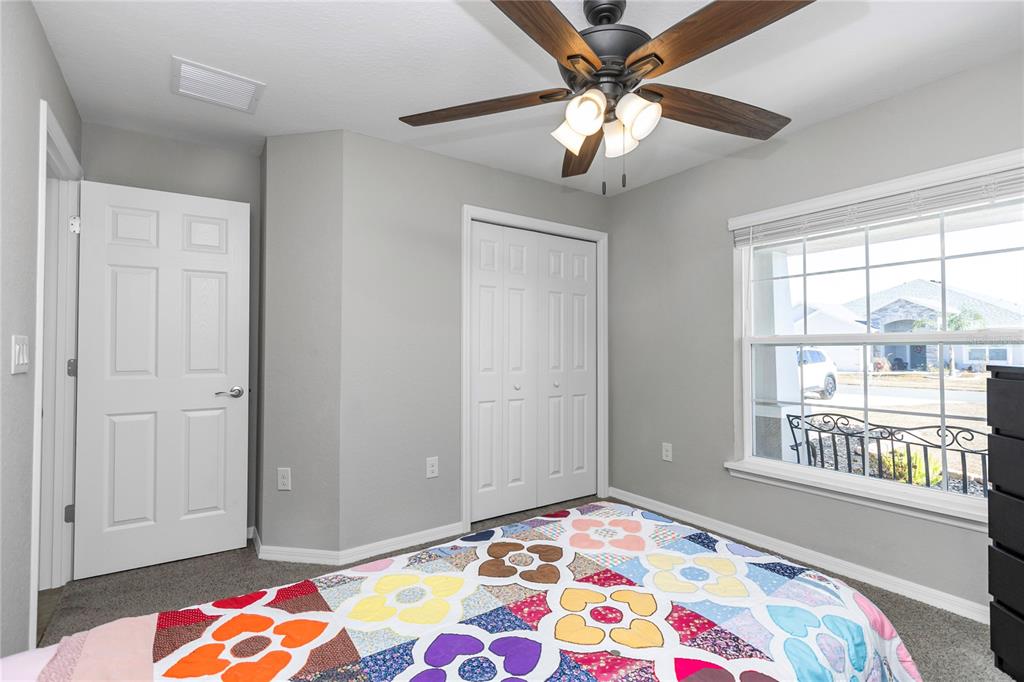 Undisclosed Address Ocala, FL 34480 - Photo 14 of 38 a bedroom with bed and a window