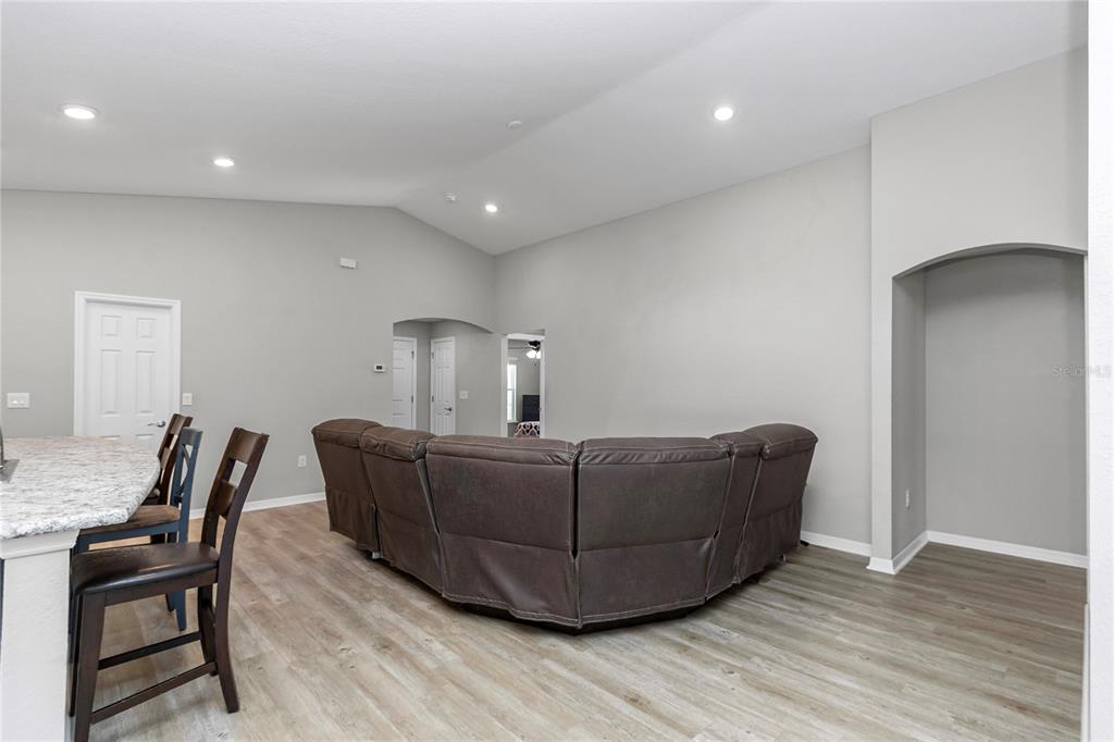 Undisclosed Address Ocala, FL 34480 - Photo 20 of 38 a living room with furniture and a wooden floor