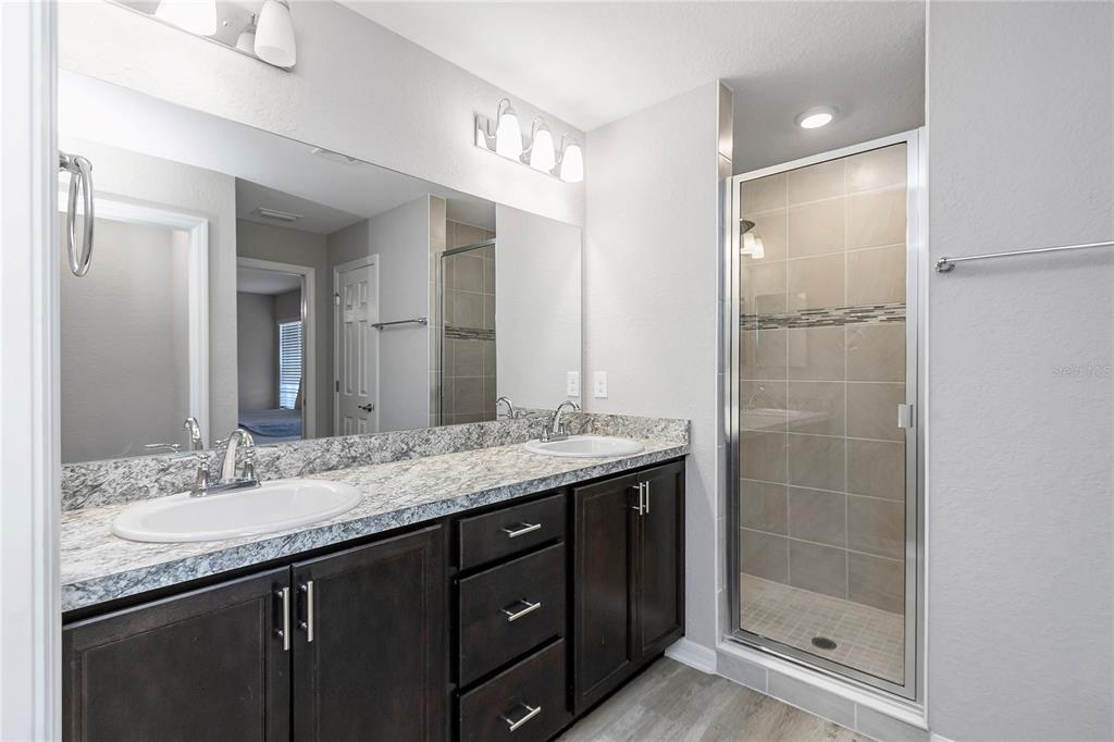 Undisclosed Address Ocala, FL 34480 - Photo 23 of 38 a bathroom with a granite countertop sink mirror and double