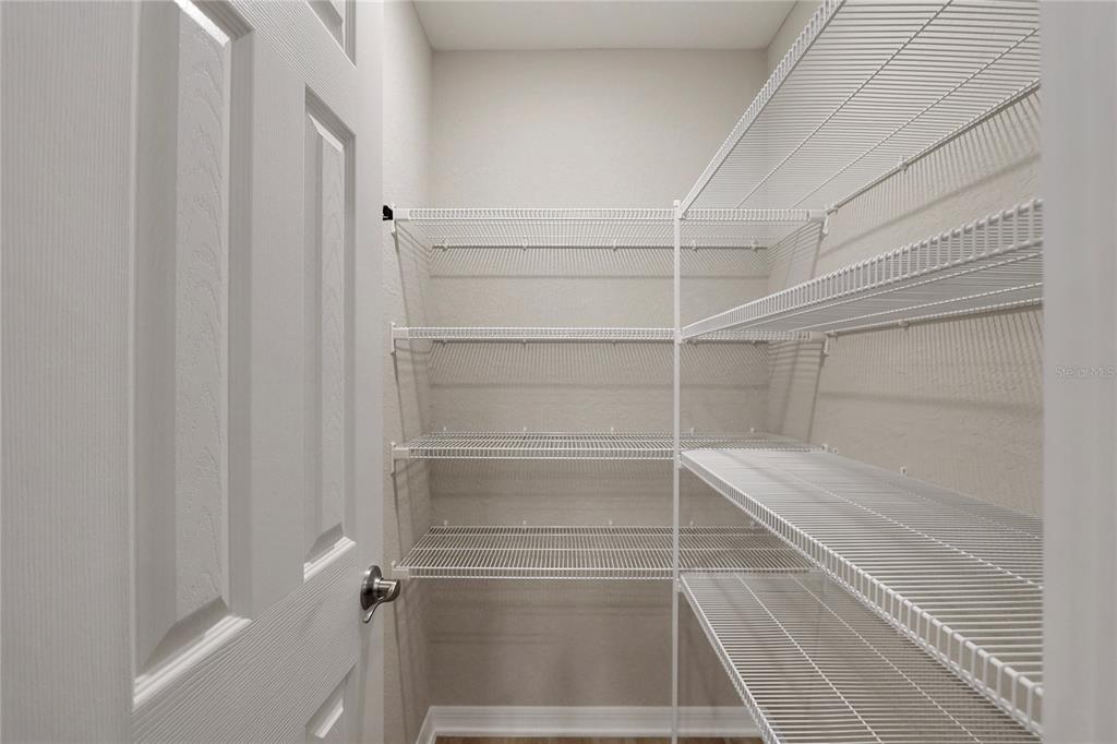 Undisclosed Address Ocala, FL 34480 - Photo 31 of 38 a view of walk in closet with empty racks