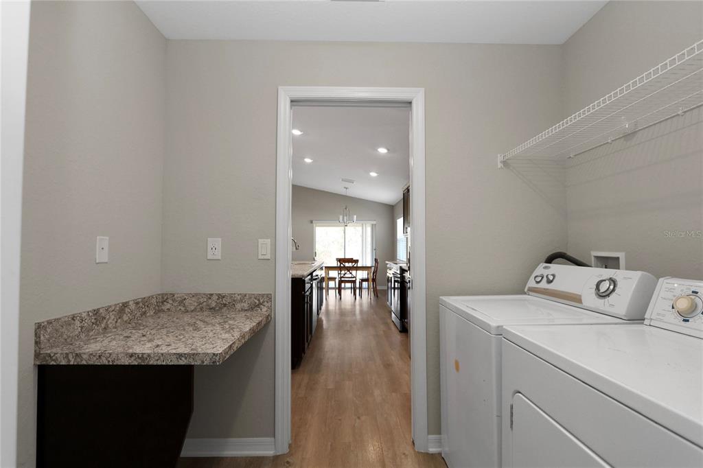 Undisclosed Address Ocala, FL 34480 - Photo 35 of 38 a view of living room with washer and dryer