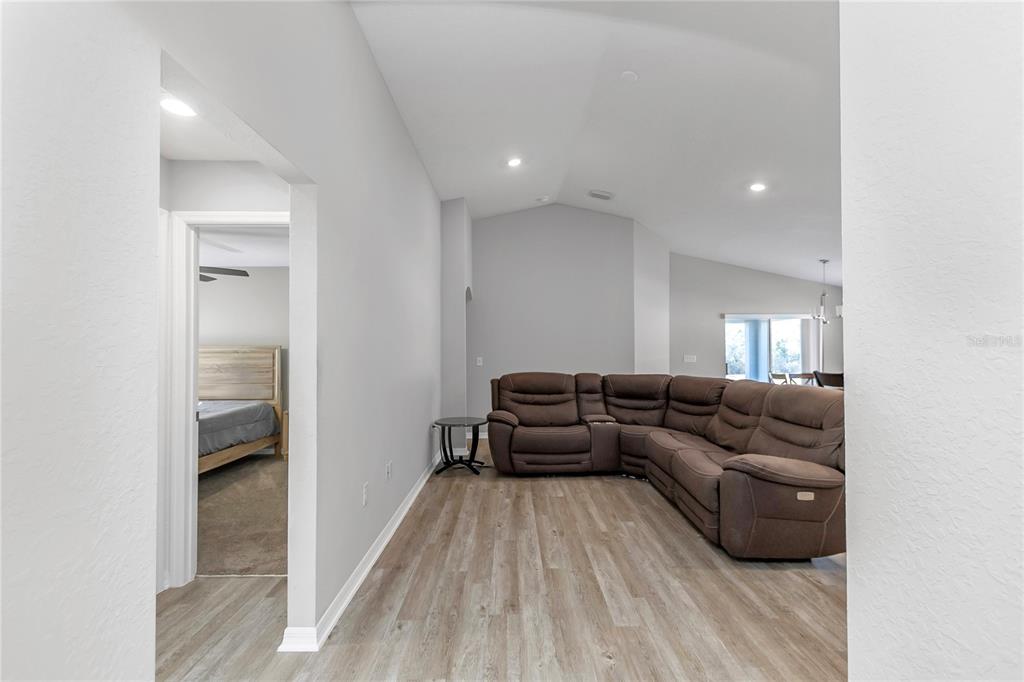 Undisclosed Address Ocala, FL 34480 - Photo 10 of 38 a living room with furniture and a wooden floor