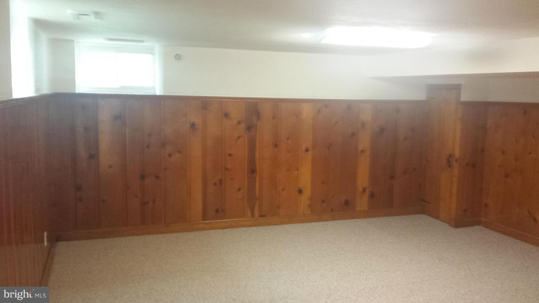 1560 Clairidge Road Baltimore, MD 21207 - Photo 2 of 16 a view of room with window