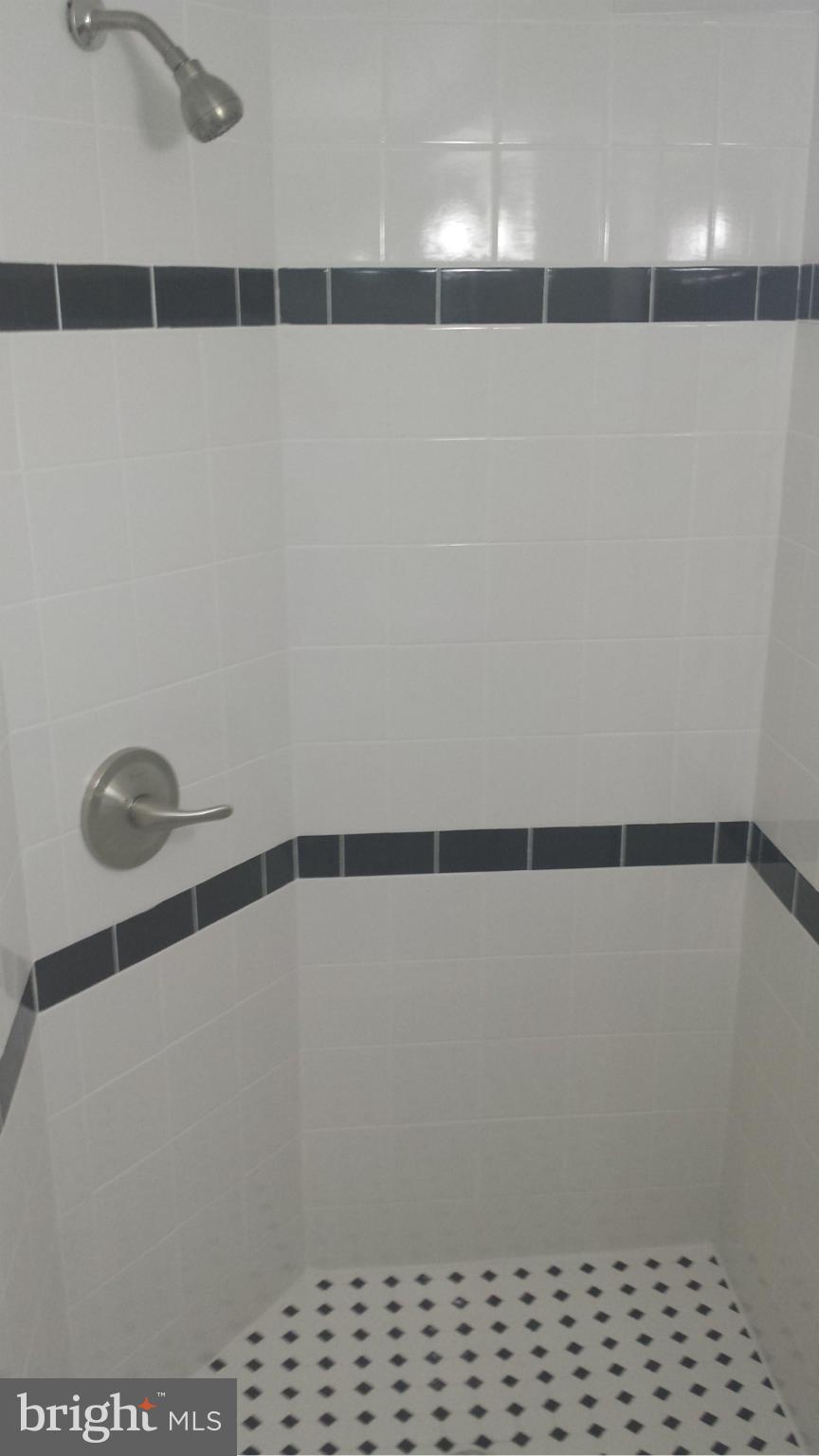 1560 Clairidge Road Baltimore, MD 21207 - Photo 6 of 16 a bathroom with a shower