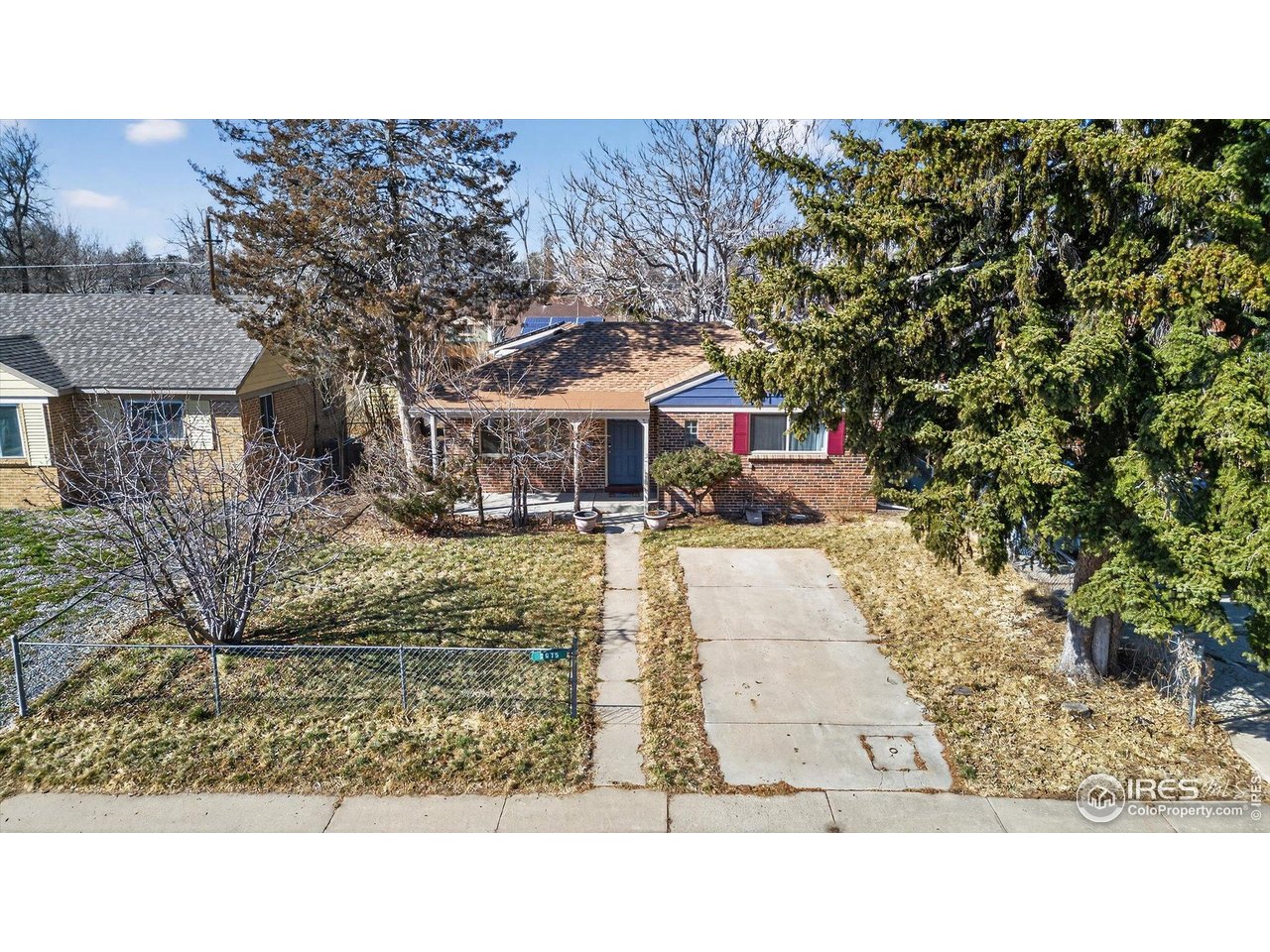 2675 Pontiac Street Denver, CO 80207 - Photo 37 of 50 a picture of a house with a yard