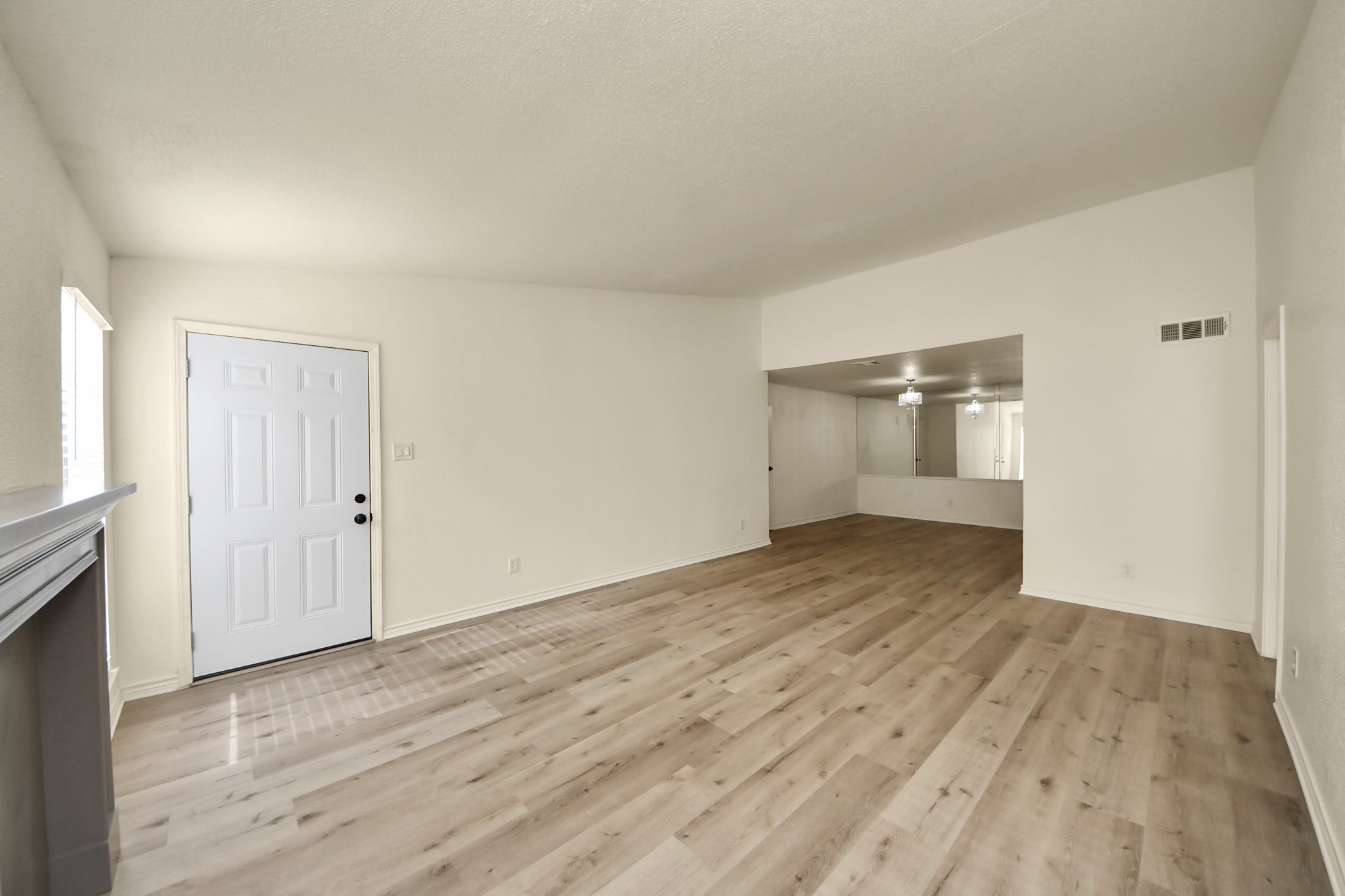 6500 Sands Point Drive, Unit 804 Houston, TX 77074 - Photo 11 of 40 a view of an empty room and wooden floor