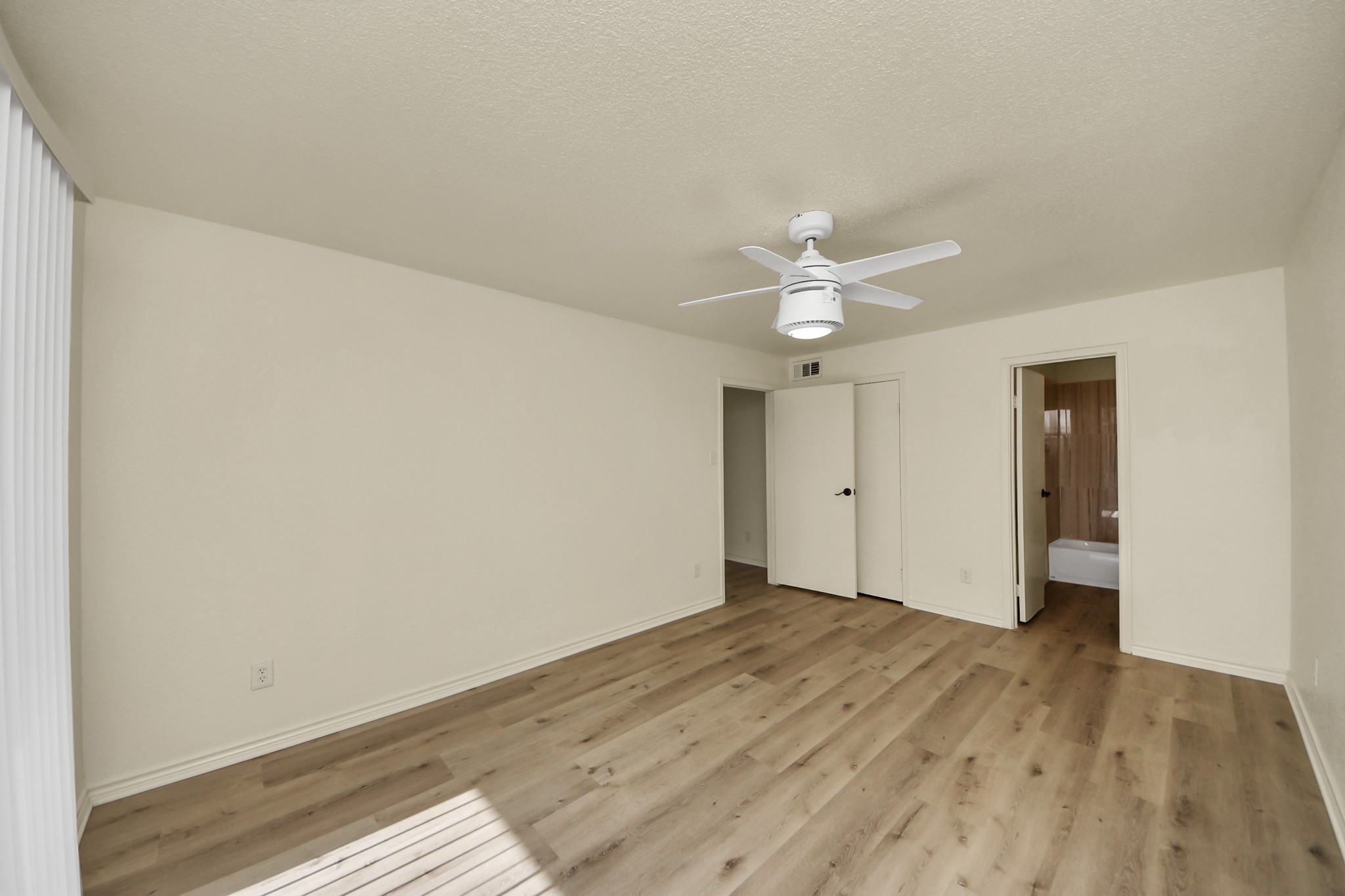 6500 Sands Point Drive, Unit 804 Houston, TX 77074 - Photo 33 of 40 wooden floor in an empty room