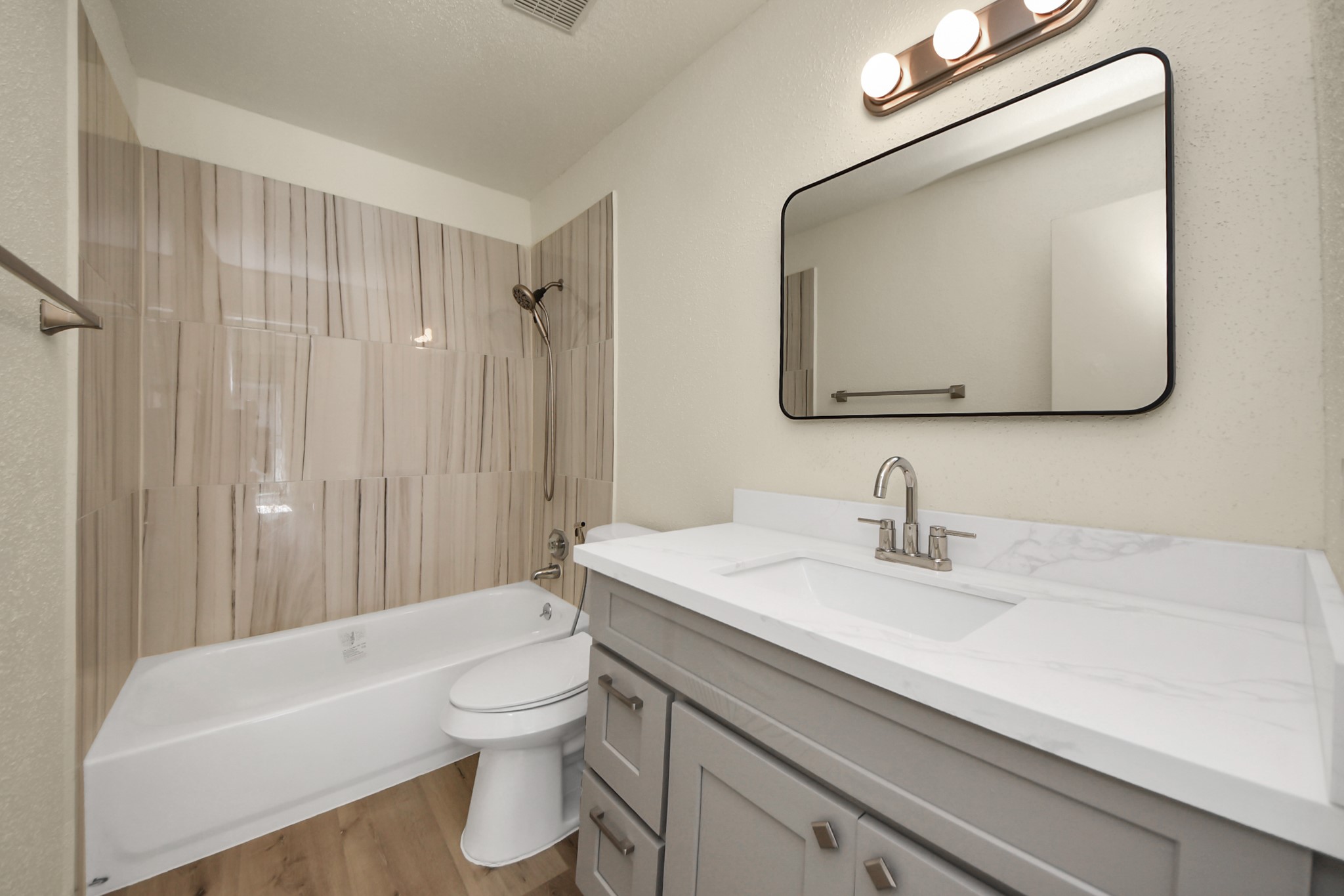 6500 Sands Point Drive, Unit 804 Houston, TX 77074 - Photo 34 of 40 a bathroom with a sink a toilet and a mirror