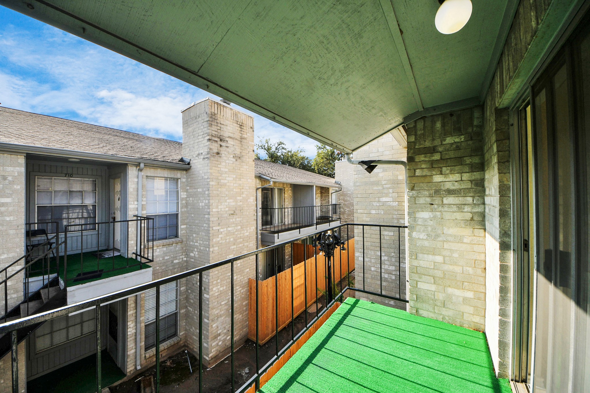 6500 Sands Point Drive, Unit 804 Houston, TX 77074 - Photo 37 of 40 a view of balcony with wooden floor